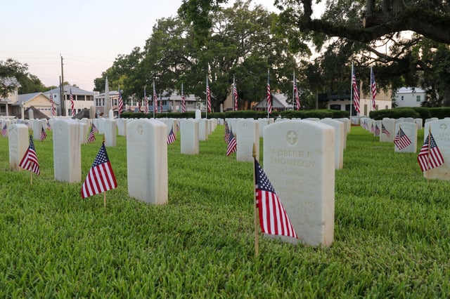 American flags placed at each grave at the St. Augustine National Cemetery in preparation for Memorial Day on May 26, 2024.