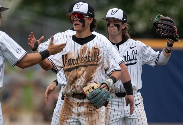Vanderbilt players celebrate after their defeat of Tennessee in the SEC baseball tournament at Hoover Met in Birmingham, Ala., on Saturday, May 24, 2025.