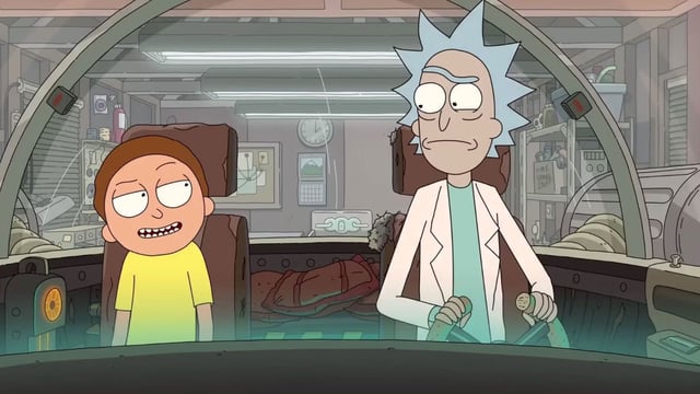 Rick and Morty look at each other sitting in Rick's parked spaceship