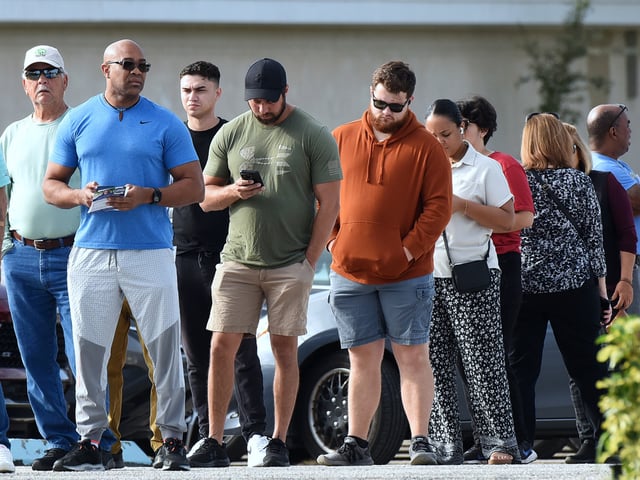 ORLANDO, FLORIDA, UNITED STATES - NOVEMBER 5: Voters wait in line at a polling station on November 5, 2024 in Orlando, Florida. Americans cast their ballots today in the presidential race between Republican nominee former President Donald Trump and Democratic nominee Vice President Kamala Harris, as well as local and statewide elections. (Photo by Paul Hennessy/Anadolu via Getty Images)