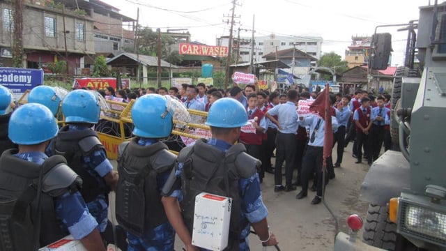 The agitation follows an incident on May 20, when a Manipur State Transport bus ferrying journalists to Ukhrul for the Shirui Lily Festival was stopped by central security personnel and ordered to remove the word “Manipur”. (HT Photo)
