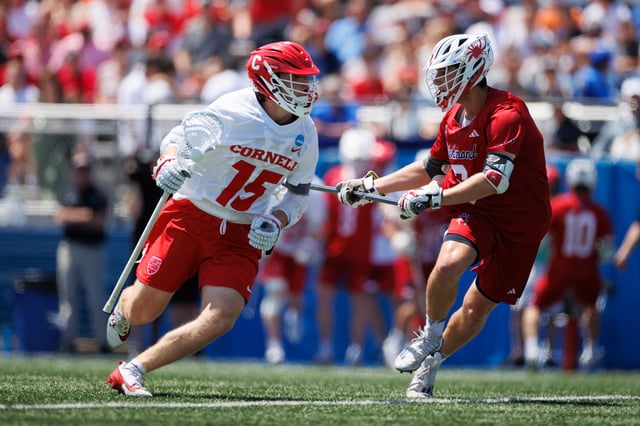 CJ Kirst #15 of the Cornell Big Red in action against the Richmond Spiders at James M. Shuart Stadium on May 17, 2025 in Hempstead, New York.