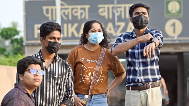 Visitors wearing protective masks as the cases of Covid are increasing widely at Connaught Place, in New Delhi, India, on Monday, May 26, 2025.