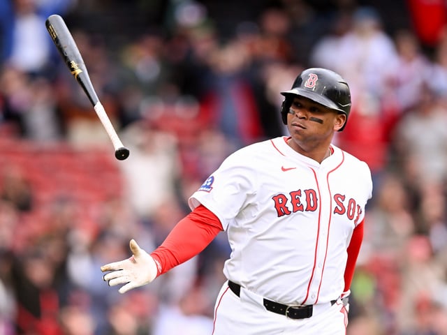 BOSTON, MASSACHUSETTS - MAY 23: Rafael Devers #11 of the Boston Red Sox reacts after hitting a three-run home run against the Baltimore Orioles during the sixth inning at Fenway Park on May 23, 2025 in Boston, Massachusetts.