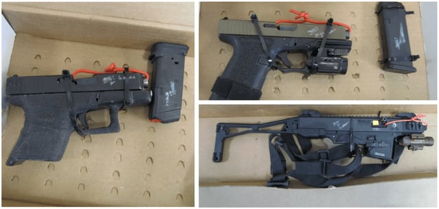 Two ghost guns and one of the rifles seized by the CBSA at the YVR airport are shown. (CBSA handout)