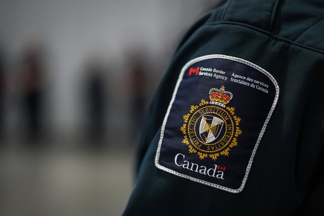 A patch is seen on the shoulder of a Canada Border Services Agency officer's uniform in Tsawwassen, B.C., Friday, Dec. 16, 2022. THE CANADIAN PRESS/Darryl Dyck