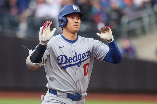 May 25, 2025; New York City, New York, USA; Los Angeles Dodgers designated hitter Shohei Ohtani (17) rounds the bases after a solo home run during the first inning against the New York Mets at Citi Field. Mandatory Credit: Vincent Carchietta-Imagn Images