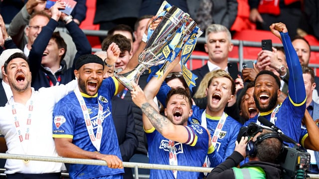 AFC Wimbledon keep the good feeling going for London clubs with victory in the League Two play-off final at Wembley