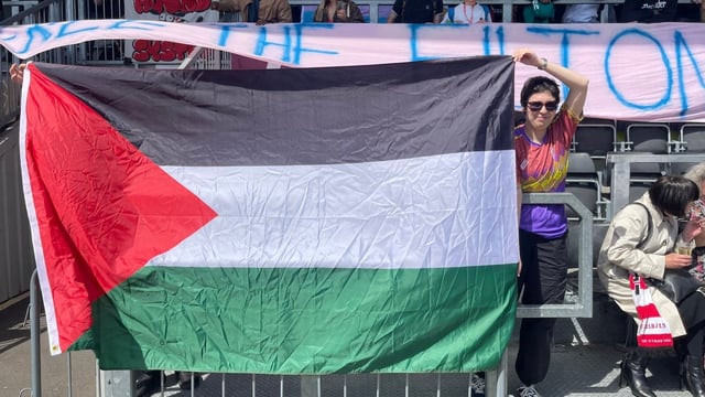 Stadium representatives objected to the display of Palestinian flags by supporters