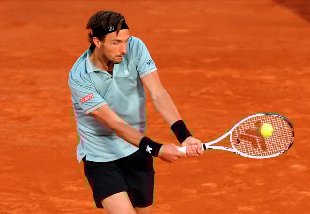 Tennis - French Open - Roland Garros, Paris, France - May 26, 2025 France's Arthur Rinderknech in action during his first round match against Italy's Jannik Sinner REUTERS/Denis Balibouse