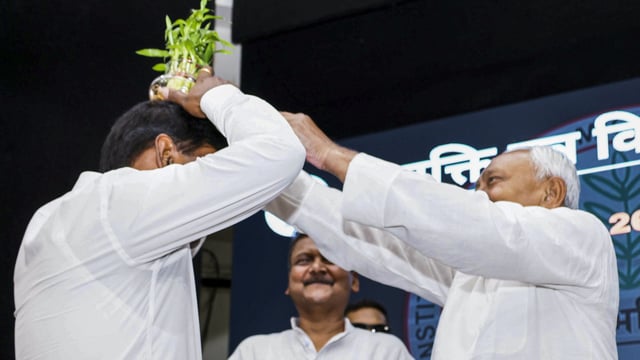 Bihar Chief Minister Nitish Kumar's act during the event garnered sharp criticism from RJD spokesperson Mrityunjay Tiwary.