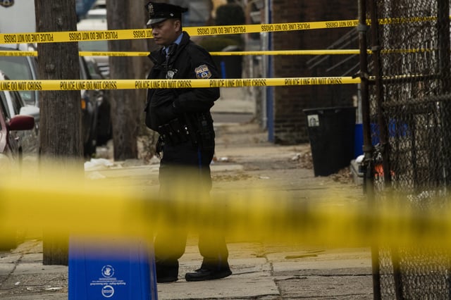 Philadelphia police at the scene of a crime in 2018.
