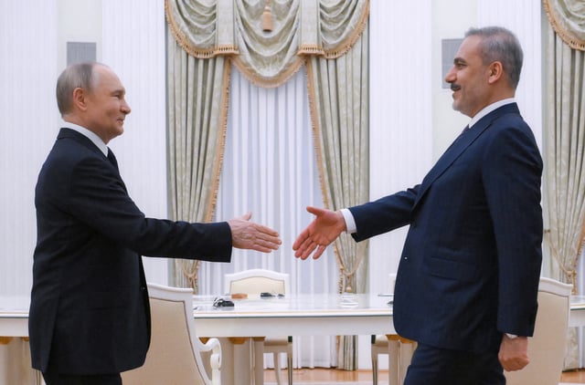Russian President Vladimir Putin and Turkish Foreign Minister Hakan Fidan shake hands before a meeting at the Kremlin in Moscow, Russia May 26, 2025. Sputnik/Alexey Maishev/Pool via REUTERS ATTENTION EDITORS - THIS IMAGE WAS PROVIDED BY A THIRD PARTY.