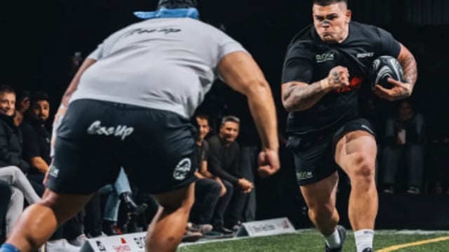 In the game RUNIT, inspired by Rugby, competitors run towards each other to collide without protective gear.