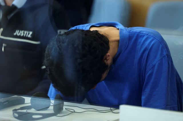 Issa al H., a Syrian national suspected of stabbing to death three people at a festival in the German city of Solingen in 2024, sits at the beginning of his trial in Duesseldorf, Germany, May 27, 2025. REUTERS/Leon Kuegeler