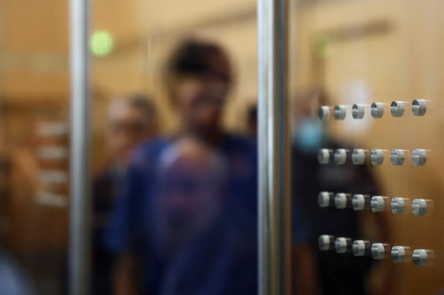Issa al H., a Syrian national suspected of stabbing to death three people at a festival in the German city of Solingen in 2024, walks at the beginning of his trial in Duesseldorf, Germany, May 27, 2025. REUTERS/Leon Kuegeler