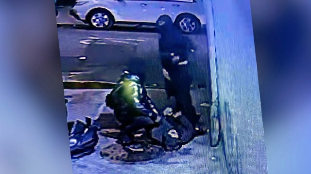 Surveillance footage shows moment two people attacked and robbed an off-duty NYPD cop of his wallet and pistol in the Bronx in the early hours of Saturday, May 24, 2025.