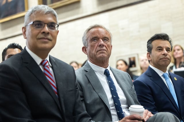 Health and Human Services Secretary Robert F. Kennedy Jr. is seen alongside Director of the National Institutes of Health Jay Bhattacharya and Commissioner of the Food and Drugs Administration Marty Makary at a news conference at the Health and Human Services Headquarters in Washington, DC on April 22.