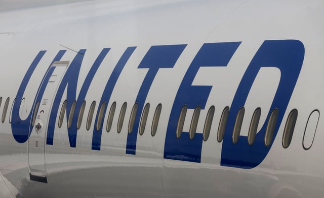 A United Airlines airplane sits parked at a gate at Newark Liberty International Airport on Feb. 20, 2025, in Newark, New Jersey.
