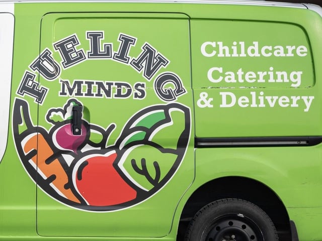 Pictured is a Fueling Minds childcare catering and delivery van outside the Fueling Brains Academy at McKnight Towne Square on Tuesday, September 5, 2023. 