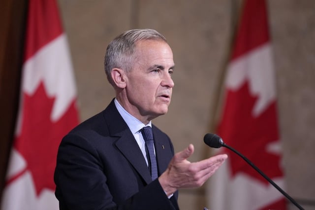 Prime Minister Mark Carney speaks with media during a news conference in Ottawa, Wednesday, May 21, 2025. THE CANADIAN PRESS/Adrian Wyld