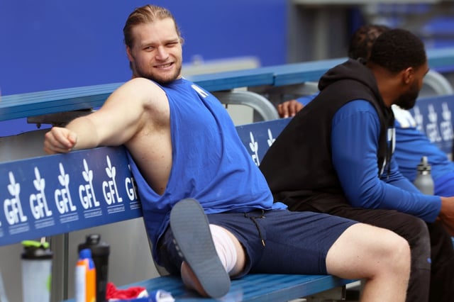 Injured defensive lineman Cam Lawson lounges during Winnipeg Blue Bombers practice on Mon., June 17, 2024.  Lawson returned to full-time practice action earlier this week, 