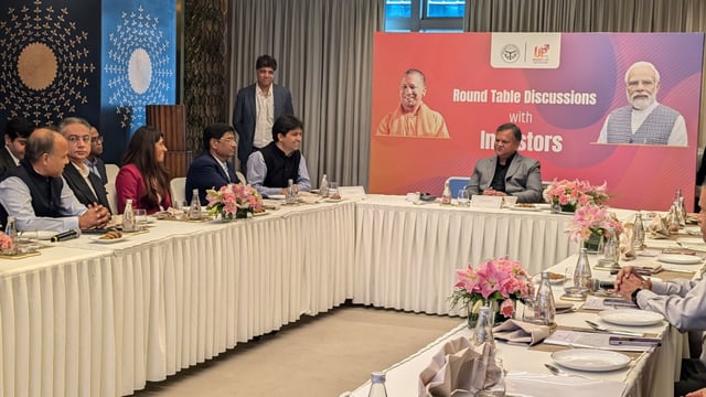 Chief secretary Manoj Kumar Singh interacts with industrialists in Mumbai on Tuesday. CEO of Invest UP Vijay Kiran Anand is also seen present on the occasion (HT)