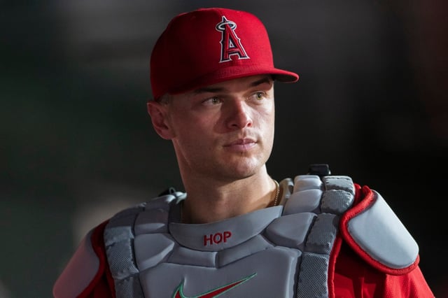 Angels catcher Logan O’Hoppe cleared concussion tests on Monday after being hit in the head on a back-swing, but he still had to be evaluated on Tuesday, so the Angels kept him out of the lineup against the New York Yankees. (AP Photo/Nic Coury)