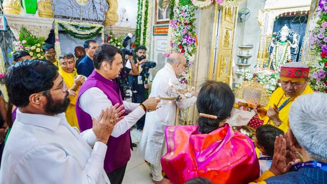 Chief minister Devendra Fadnavis accompanied union home minister Amit Shah during his visit to the Shri Lakshmi Narayan Temple in Madhavbaug on Tuesday. (CMO Maharashtra - X)