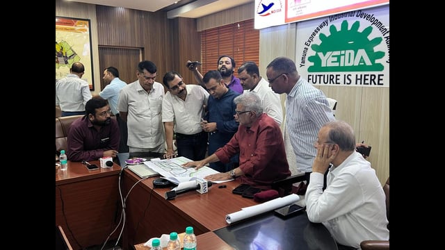 YEIDA officials reviewing layout plan of the Int’l Film City submitted by Bayview Projects LLP on Tuesday. (Sourced)