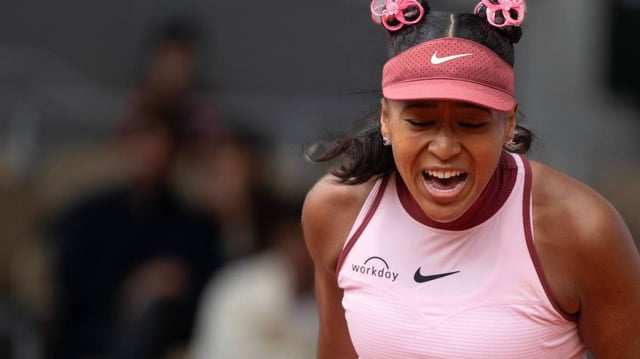 Naomi Osaka of Japan reacts to a point during her match against Paula Badosa of Spain on day two at Roland Garros Stadium.