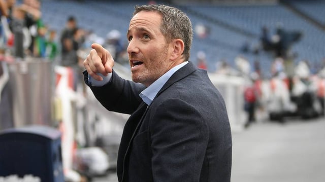 Philadelphia Eagles executive vice president and general manager Howie Roseman speaks to fans before a game between the New England Patriots and the Philadelphia Eagles at Gillette Stadium.