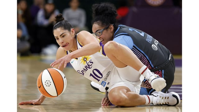 Sparks guard Kelsey Plum steals the ball from the Atlanta Dream’s Te-Hina Paopao during the first half on Tuesday night at Crypto.com Arena. (Photo by Harry How/Getty Images)