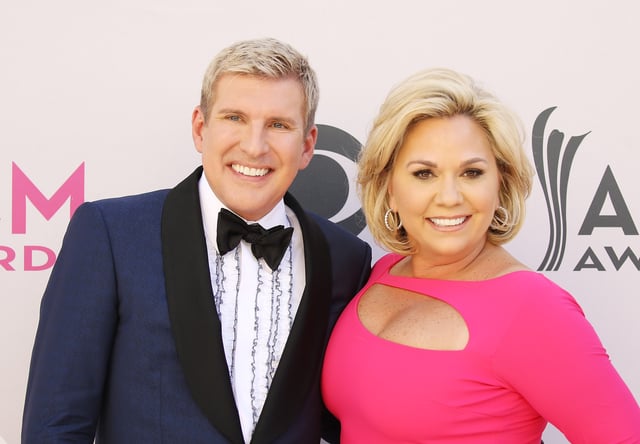 Todd Chrisley and Julie Chrisley arrive at the 52nd Academy of Country Music Awards held at T-Mobile Arena on April 2, 2017 in Las Vegas, Nevada. President Donald Trump said he plans to pardon the pair, who were jailed for fraud in 2022.