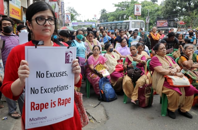 People attend a protest against violence against women, in Kolkata, India. Photo: EPA-EFE