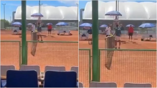 The Pakistan player (L) attempts to forcefully strike India player's hand