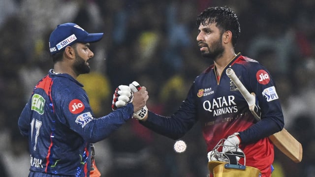 Royal Challengers Bengaluru's Jitesh Sharma shake hands with Lucknow Super Giants' captain Rishabh Pant