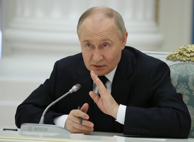 MOSCOW, RUSSIA - MAY 26 (RUSSIA OUT) Russian President Vladimir Putin gestures during his meeting with local business leaders at the Saint Yekeaterina&#39;s Hall of the Kremlin, May 26, 2025 in Moscow, Russia. Putin met Russian businessmen, marking the Day of the Entrepreneur.