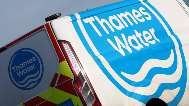 Signage is seen on a Thames Water service vehicle, in London, Britain