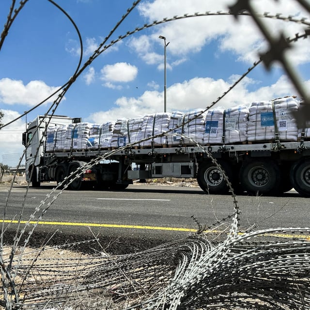 A truck carrying aid arrives at the Kerem Shalom crossing between Israel and Gaza, on its Israeli side, May 28, 2025. REUTERS/Shafiek Tassiem