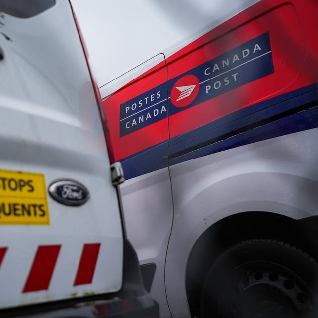 Canada Post says it has received strike notices from the union representing some 55,000 postal workers, with operations poised to shut down by end of week. Canada Post vehicles are seen parked at a delivery depot in Vancouver, B.C., Tuesday, Dec. 17, 2024.  THE CANADIAN PRESS/Darryl Dyck