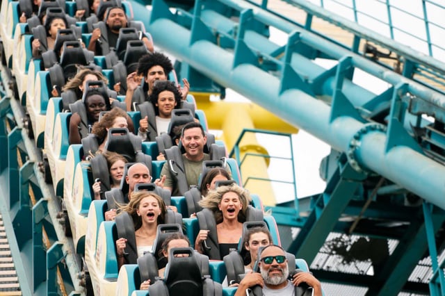 Riders find their thrills aboard the rollercoaster Boomerang at Six Flags Discovery Kingdom in Vallejo on September 2, 2023. Six Flags will lay off employees at Discovery Kingdom and California’s Great America as it restructures operations and eliminates local leadership roles following its $8 billion merger with Cedar Fair.