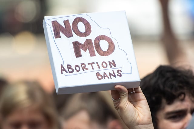 TOPSHOT - Thousands of demonstrators march in support of Planned Parenthood and pro-choice as they protest a state decision that would effectively halt abortions by revoking the license of the last center in the state that performs the procedure, during a rally in St. Louis, Missouri, May 30, 2019. (Photo by SAUL LOEB / AFP) (Photo by SAUL LOEB/AFP via Getty Images)
