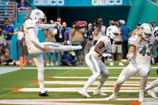 Sep 25, 2022; Miami Gardens, Florida, USA; Miami Dolphins punter Thomas Morstead (4) punts the ball off of the backside of wide receiver Trent Sherfield (14) resulting in the ball going out of bounds and a safety for the Buffalo Bills during the second half at Hard Rock Stadium. Mandatory Credit: Jasen Vinlove-USA TODAY Sports/File Photo