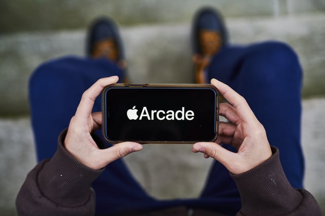 Apple Arcade video game subscription service signage is displayed on an iPhone in an arranged photograph taken in the Queens Borough of New York, U.S., on Sunday, Jan. 26, 2020. Apple Inc. is scheduled to release earnings figures on January 28. Photographer: Gabby Jones/Bloomberg via Getty Images