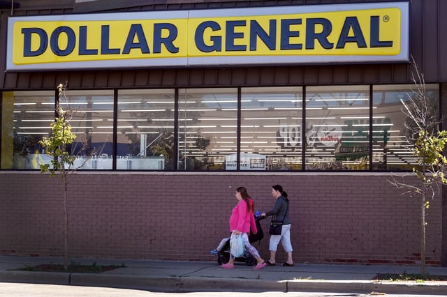 A sign hangs above a Dollar General store on August 31, 2023 in Chicago, Illinois.