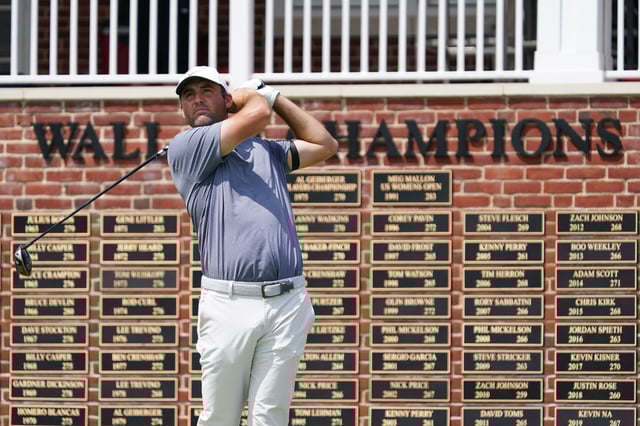 May 25, 2025; Fort Worth, Texas, USA; Scottie Scheffler watches his shot from the first tee during the final round of the Charles Schwab Challenge golf tournament. Mandatory Credit: Raymond Carlin III-Imagn Images/File Photo