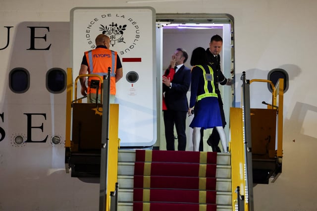 France's President Emmanuel Macron was seemingly pushed in the face by his wife Brigitte Macron as the couple arrived in Vietnam to begin a tour of Southeast Asia, at Noi Bai International Airport, in Hanoi, Vietnam on May 25, 2025