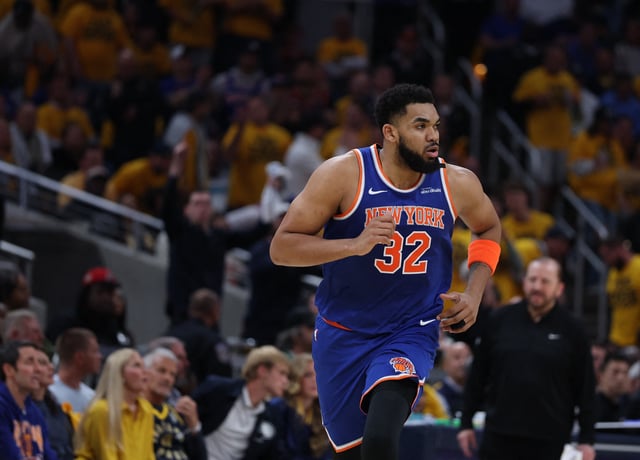 May 27, 2025; Indianapolis, Indiana, USA; New York Knicks center Karl-Anthony Towns (32) runs up court during the second quarter against the Indiana Pacers during game four of the eastern conference finals for the 2025 NBA Playoffs at Gainbridge Fieldhouse. Mandatory Credit: Trevor Ruszkowski-Imagn Images/File Photo