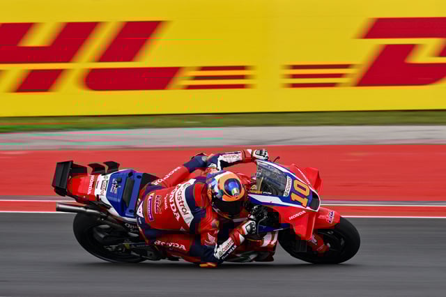 Mar 29, 2025; Austin, TX, USA; Luca Marini (10) of Italy and Honda HRC Castrol rides during qualifying for the 2025 MotoGP Grand Prix of the Americas at Circuit of The Americas. Mandatory Credit: Jerome Miron-Imagn Images/File Photo